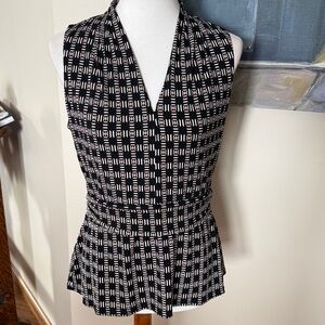 Woman’s White House Black Market, top size medium.